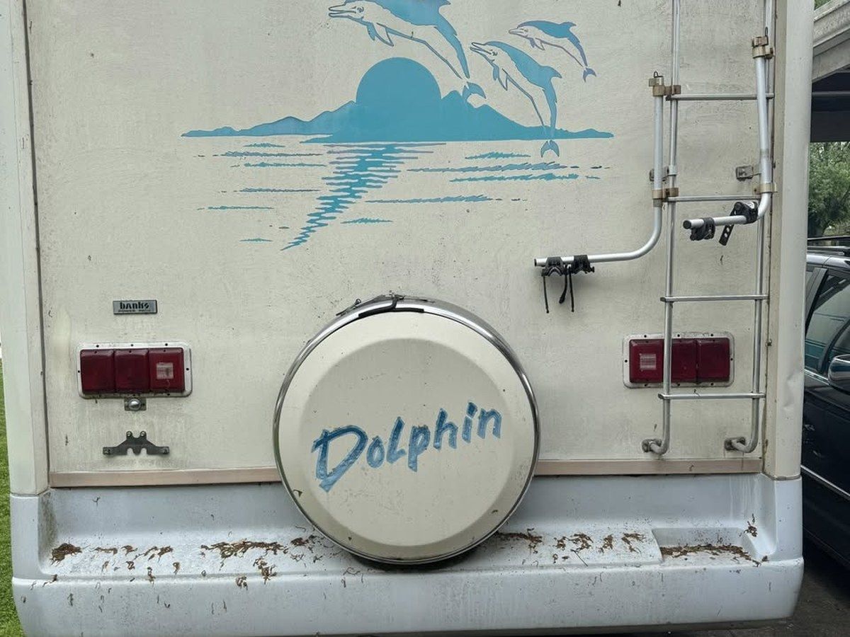 Before — Class C motorhome weathered with debris